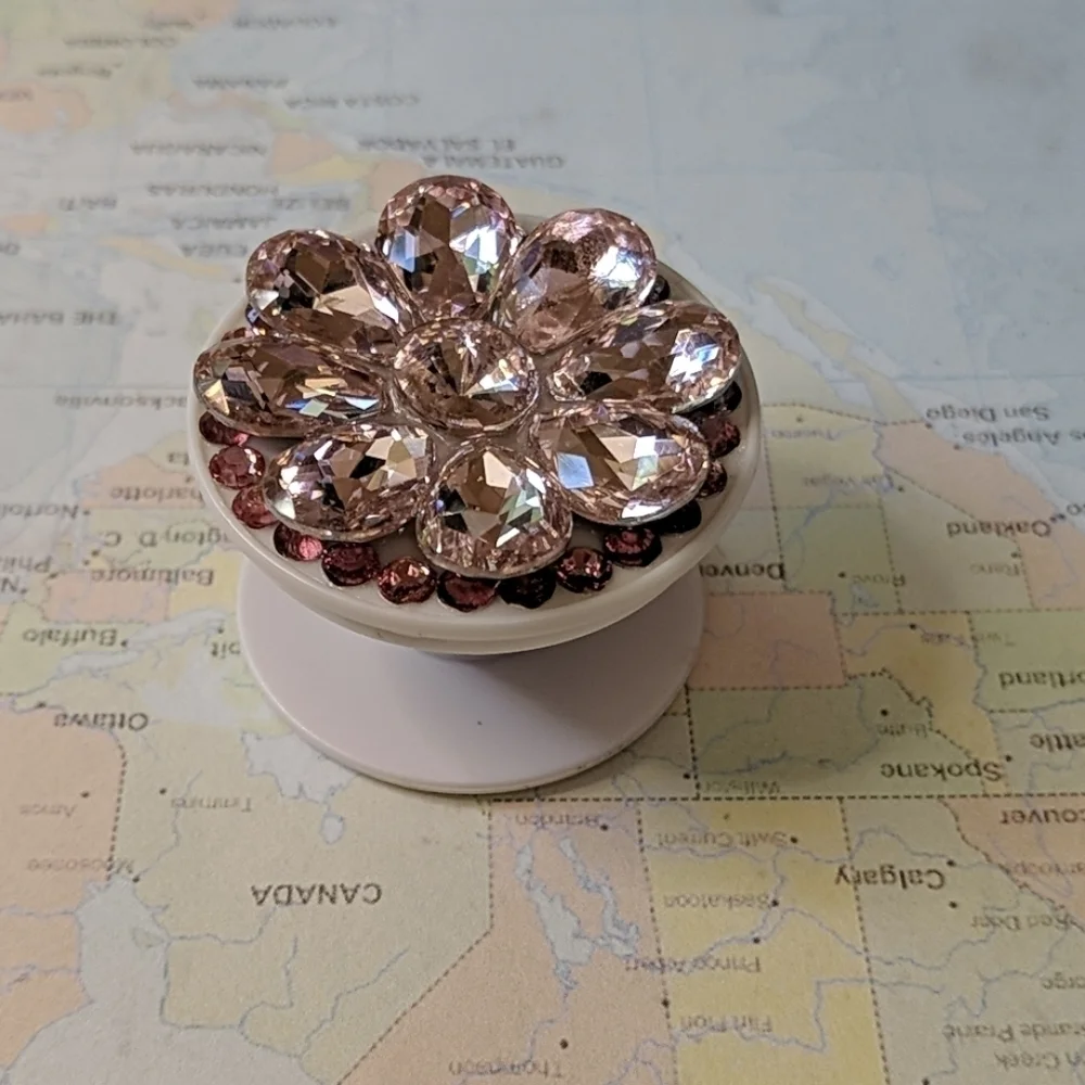 Pink bejeweled phone holder